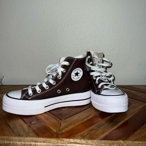 Brown platform high top converse